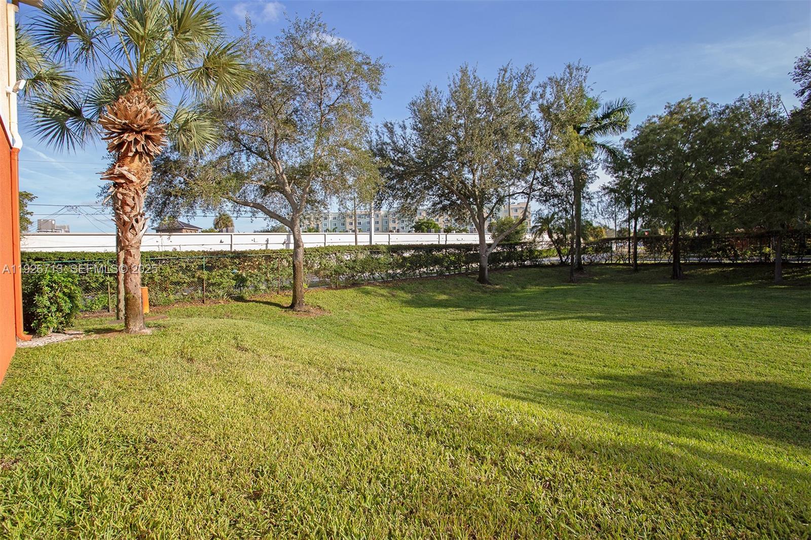 3340 Palomino Drive, Unit 2112 Davie, FL 33024 - Photo 21 of 25 a view of yard with swimming pool and green space