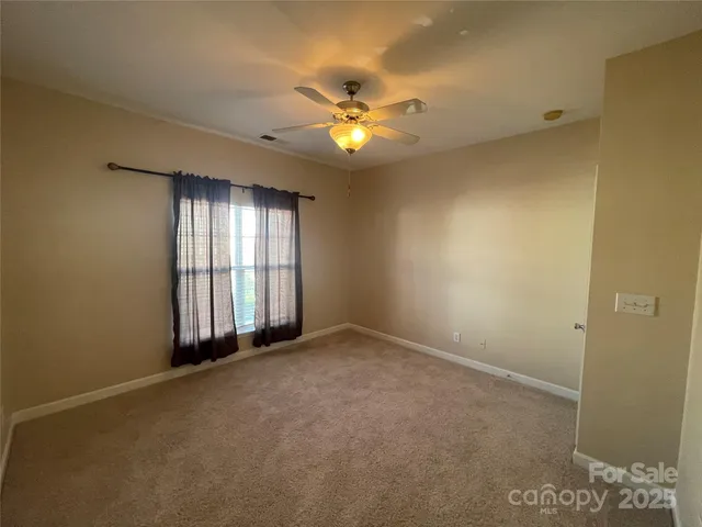 a bathroom with a toilet and a bathtub