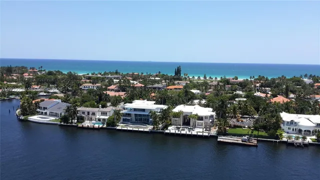 an aerial view of a city with lots of residential buildings