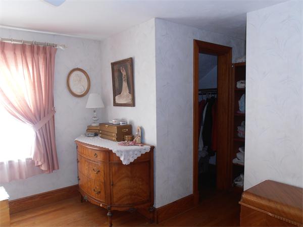 54 Denver Street Springfield, MA 01109 - Photo 12 of 30 a view of room with window and wooden floor