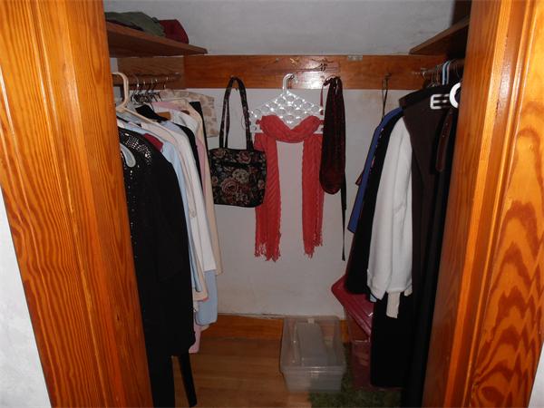 54 Denver Street Springfield, MA 01109 - Photo 13 of 30 a view of walk in closet with clothes and shoes
