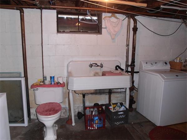 54 Denver Street Springfield, MA 01109 - Photo 28 of 30 a utility room with dryer and washer