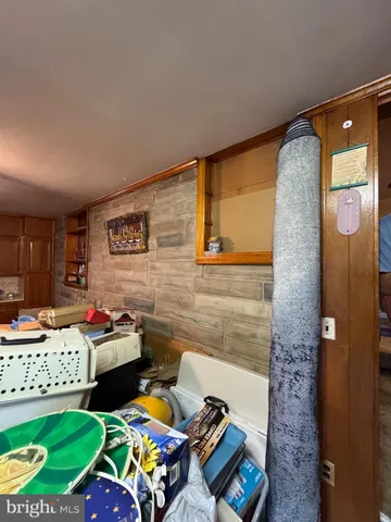 a room with lots of furniture and utility