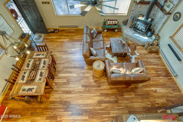 a bedroom with a bed and a tv on the dresser