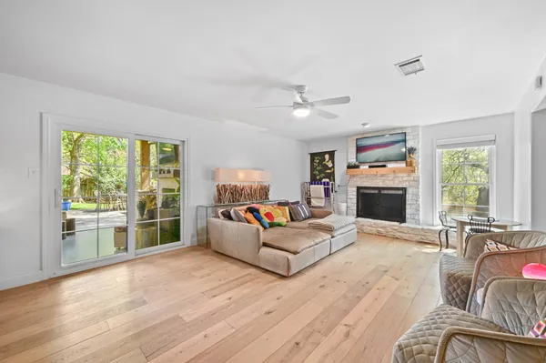 a bedroom with a large bed and a couch