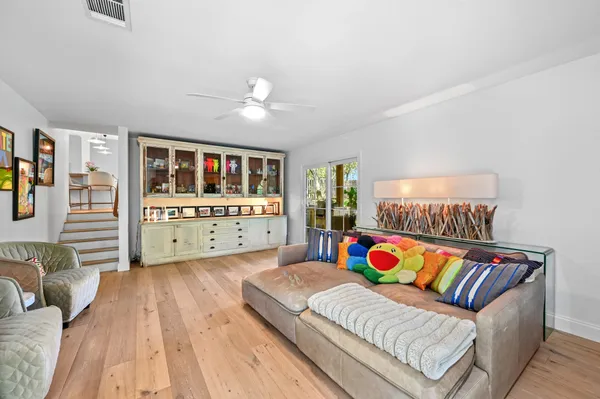 a spacious bedroom with a bed and a fireplace