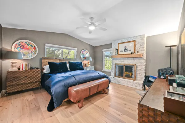 a bathroom with a shower sink and mirror