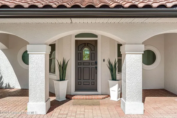 a view of living room filled with furniture