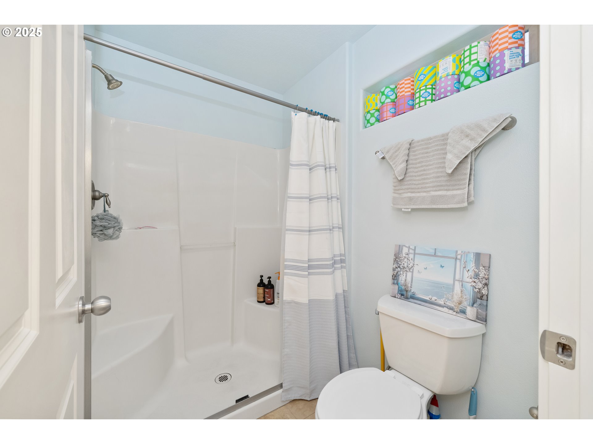 140 Breezee Way Tillamook, OR 97141 - Photo 11 of 46 a bathroom with a toilet sink and shower