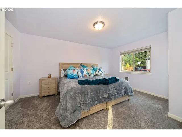 a bathroom with a toilet a sink and a mirror