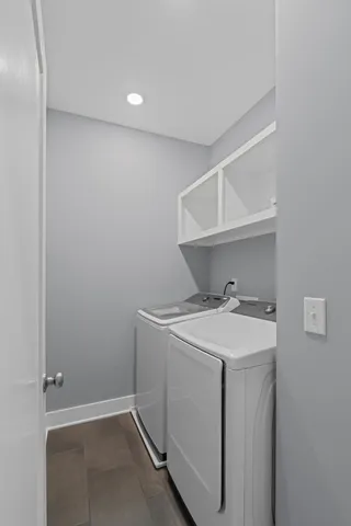 a utility room with dryer and washer