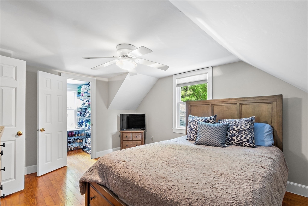 61 Pine Ridge Drive Franklin, MA 02038 - Photo 23 of 41 a bedroom with a large bed and a tv