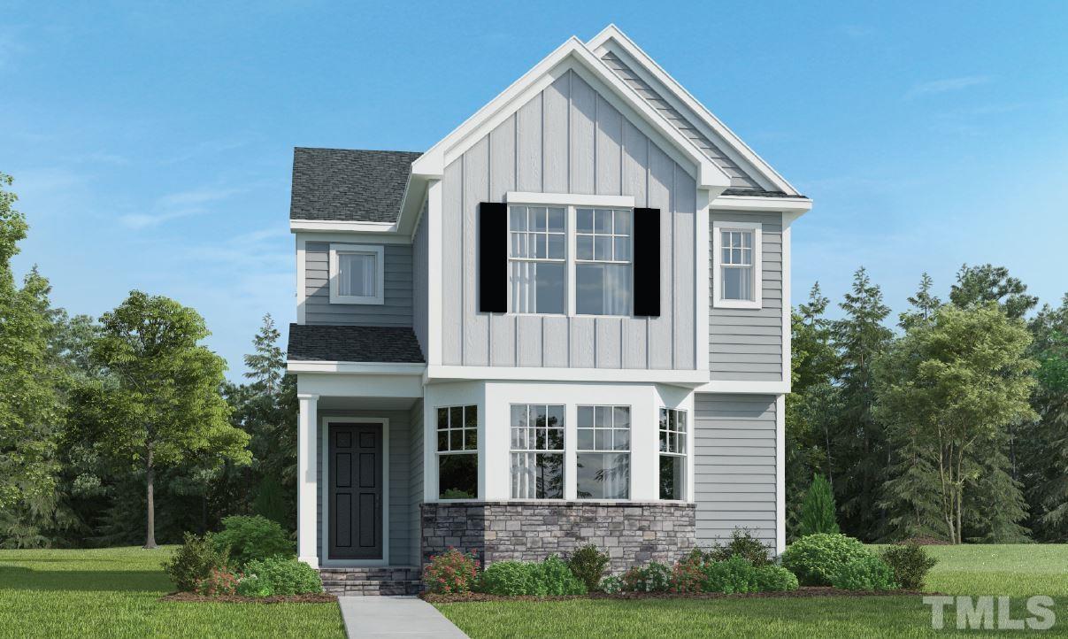2997 Rise And Shine Road, Unit 559 WALKER A Apex, NC 27502 - Photo 1 of 14 a view of a house with yard and plants
