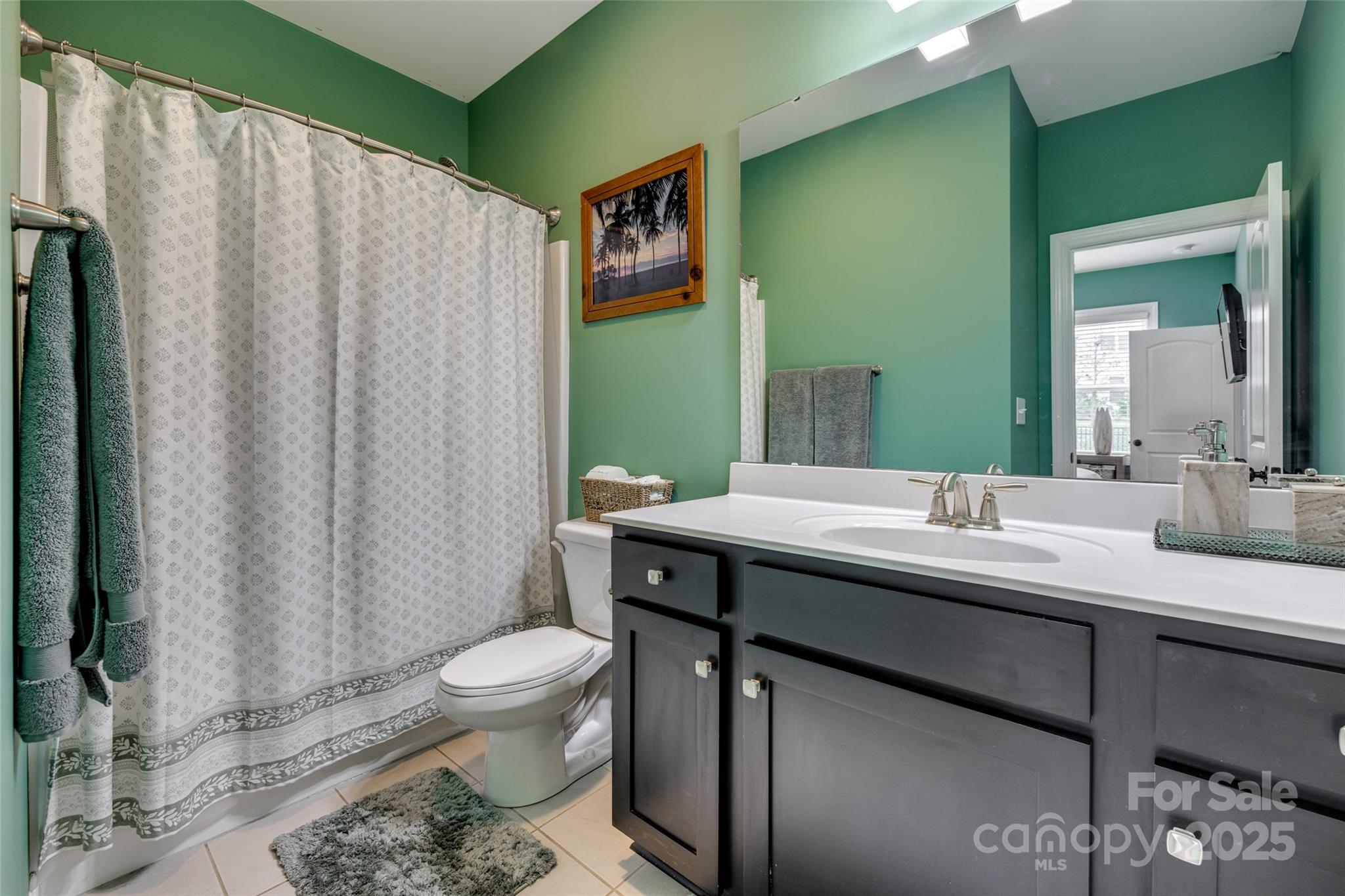 5431 Meadowcroft Way Fort Mill, SC 29708 - Photo 17 of 40 a bathroom with a toilet a sink and a mirror