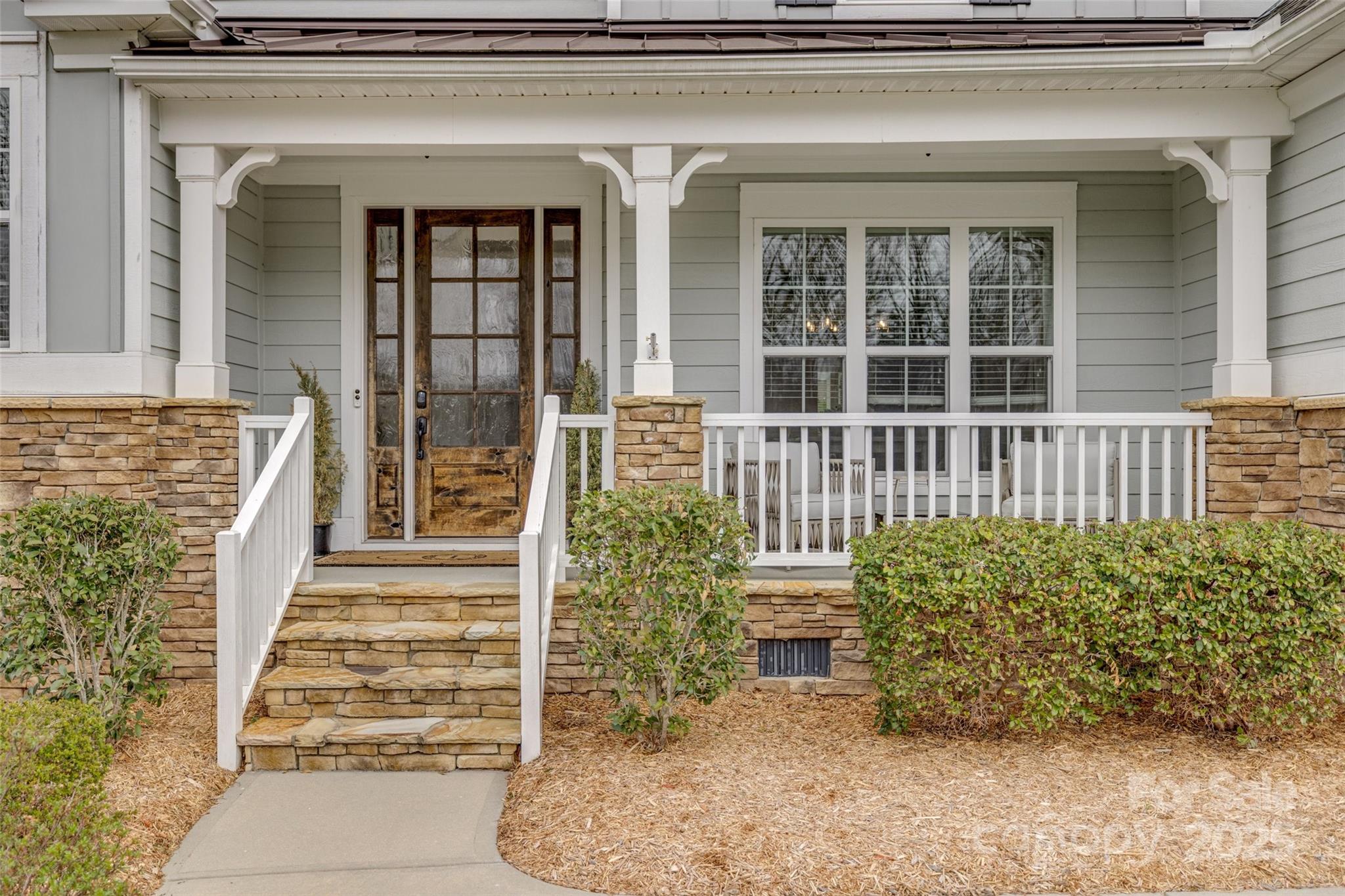 5431 Meadowcroft Way Fort Mill, SC 29708 - Photo 2 of 40 front view of a house with a porch