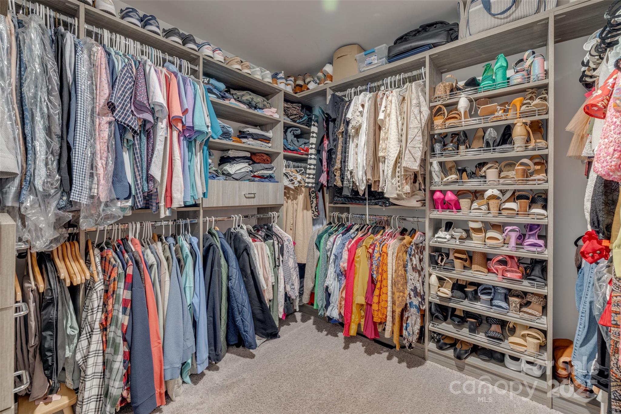 5431 Meadowcroft Way Fort Mill, SC 29708 - Photo 26 of 40 a view of walk in closet with clothes and shoes