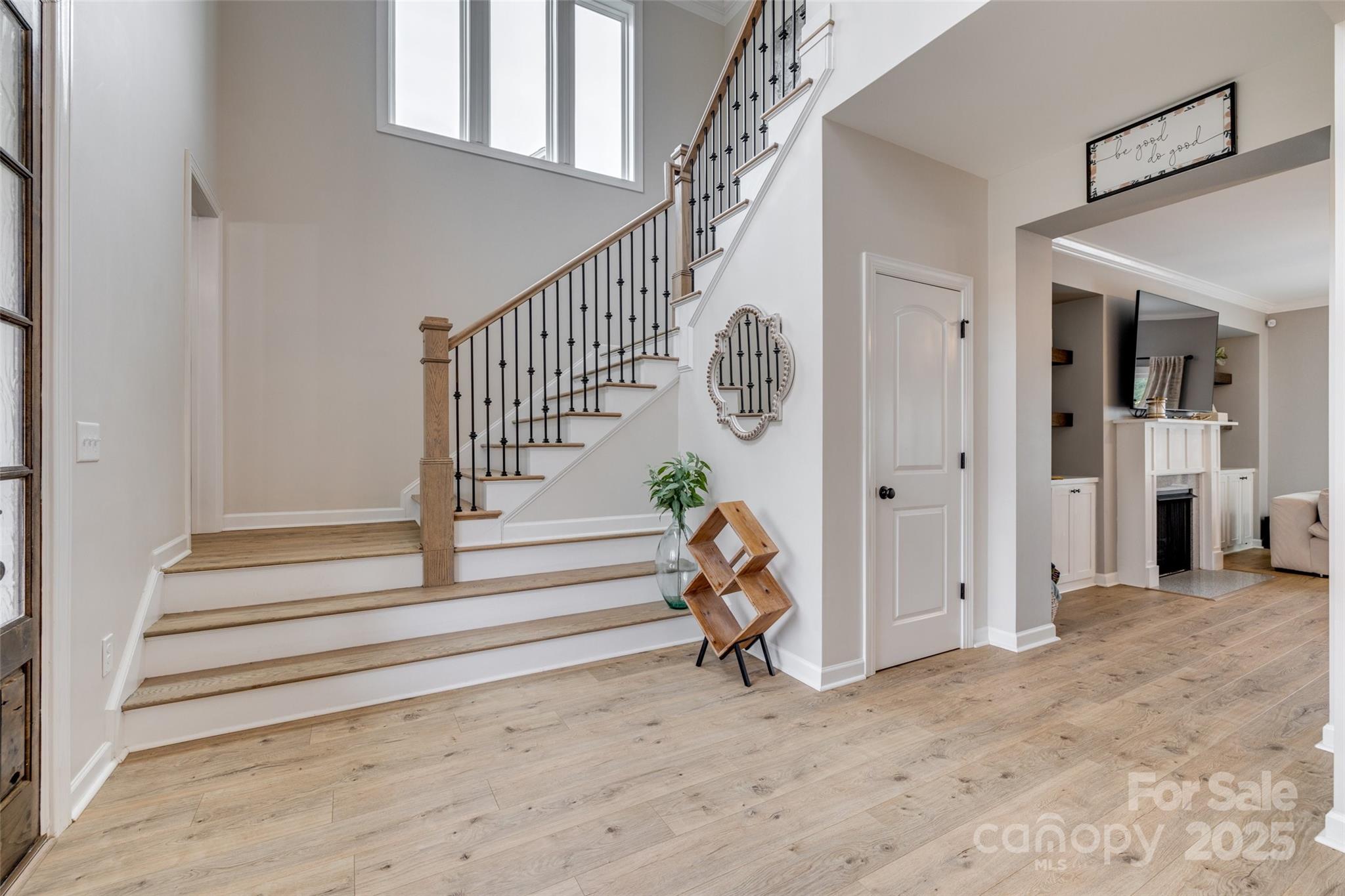 5431 Meadowcroft Way Fort Mill, SC 29708 - Photo 5 of 40 a view of entryway with wooden floor and stairs