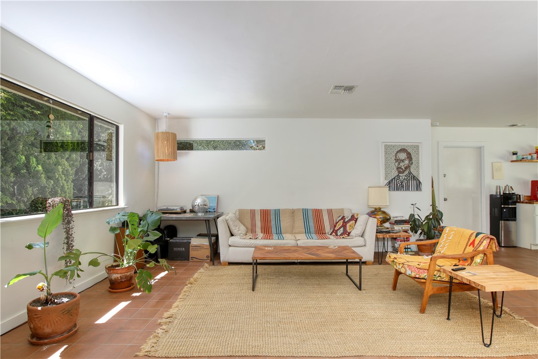 15050 Morro Road Atascadero, CA 93422 - Photo 4 of 33 a living room with furniture and a potted plant
