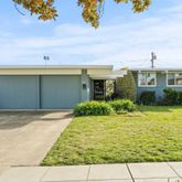 a front view of a house having yard