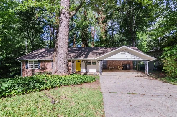 front view of a house with a yard