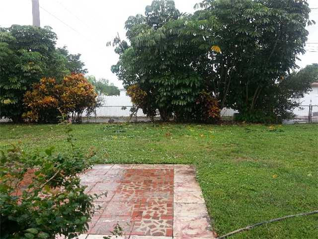 5521 Buchanan Street Hollywood, FL 33021 - Photo 3 of 12 a view of a park with trees