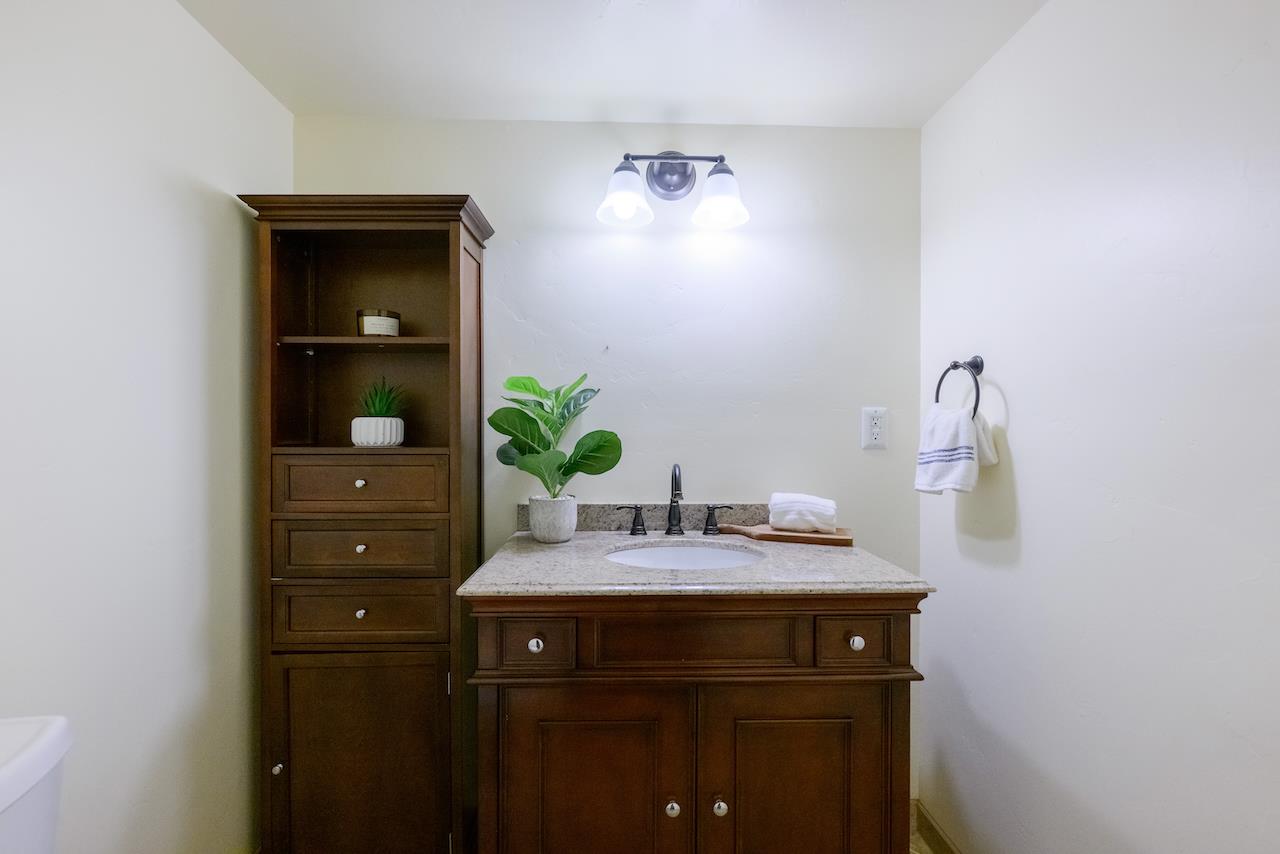 295 Jim's Road Ben Lomond, CA 95005 - Photo 105 of 139 a bathroom with a sink vanity and a mirror