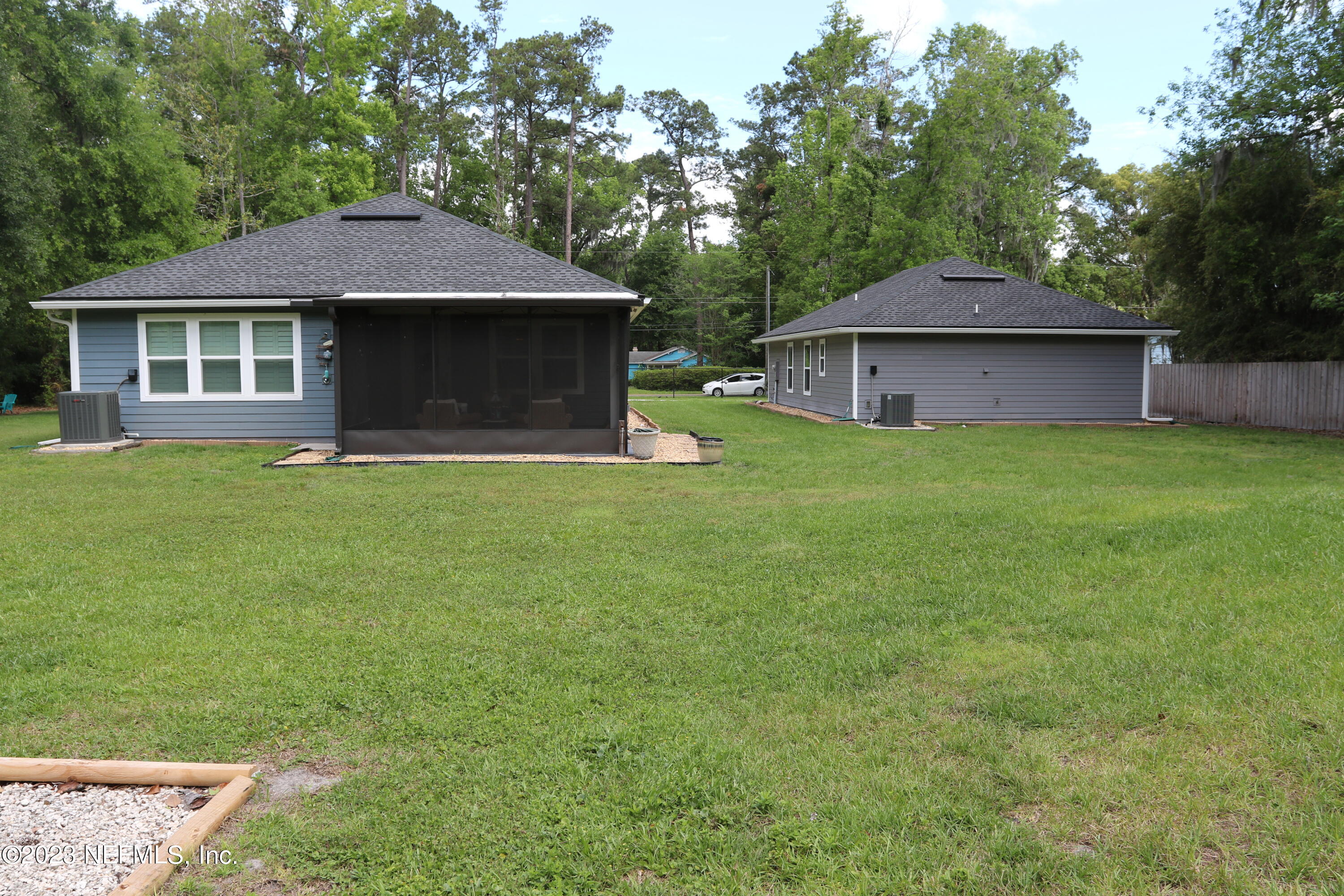 3836 Collins Road Jacksonville, FL 32244 - Photo 11 of 40 a front view of a house with garden