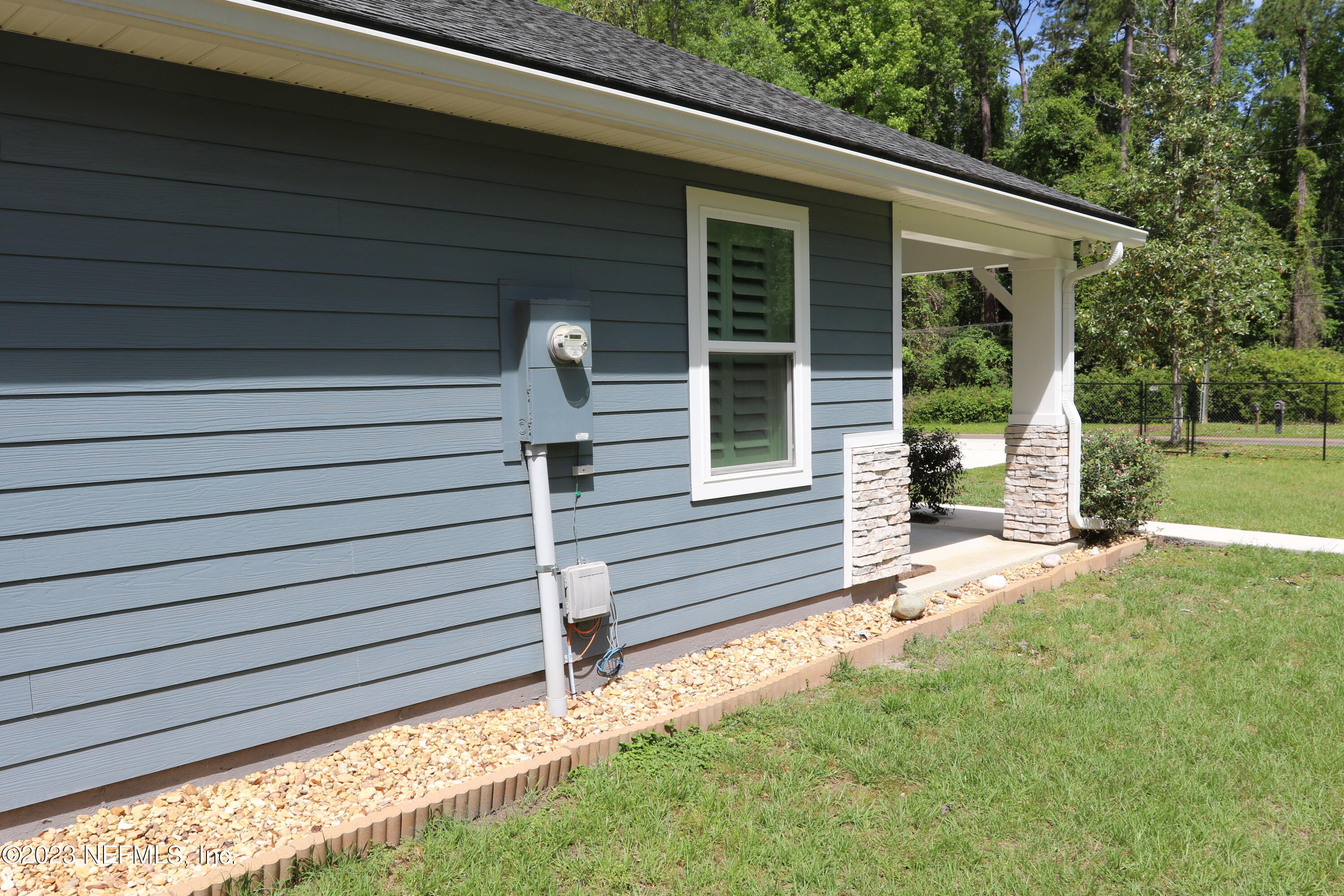 3836 Collins Road Jacksonville, FL 32244 - Photo 15 of 40 a view of a back yard of the house