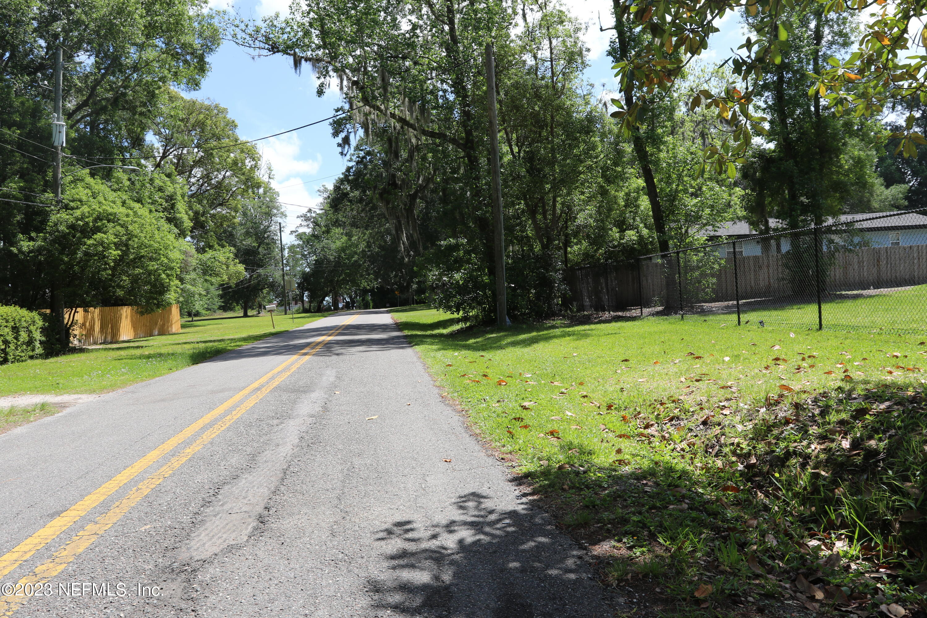 3836 Collins Road Jacksonville, FL 32244 - Photo 39 of 40 a view of swimming pool with a yard