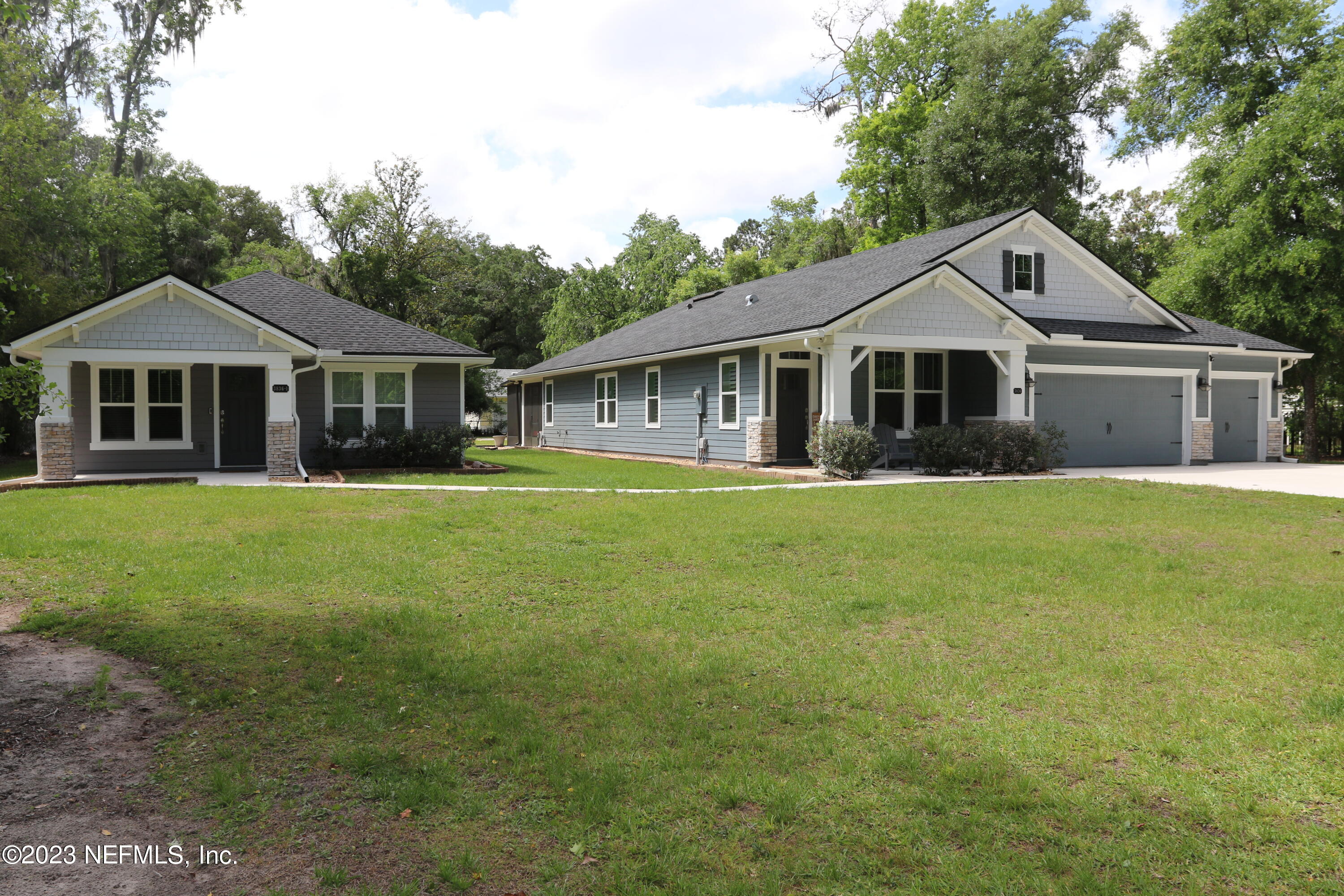 3836 Collins Road Jacksonville, FL 32244 - Photo 4 of 40 a front view of house with yard and green space