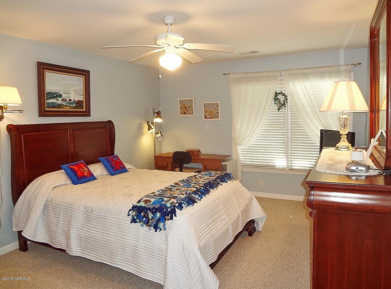 119 Rice Mill Circle, Unit 1 Sunset Beach, NC 28468 - Photo 16 of 37 Master Bedroom