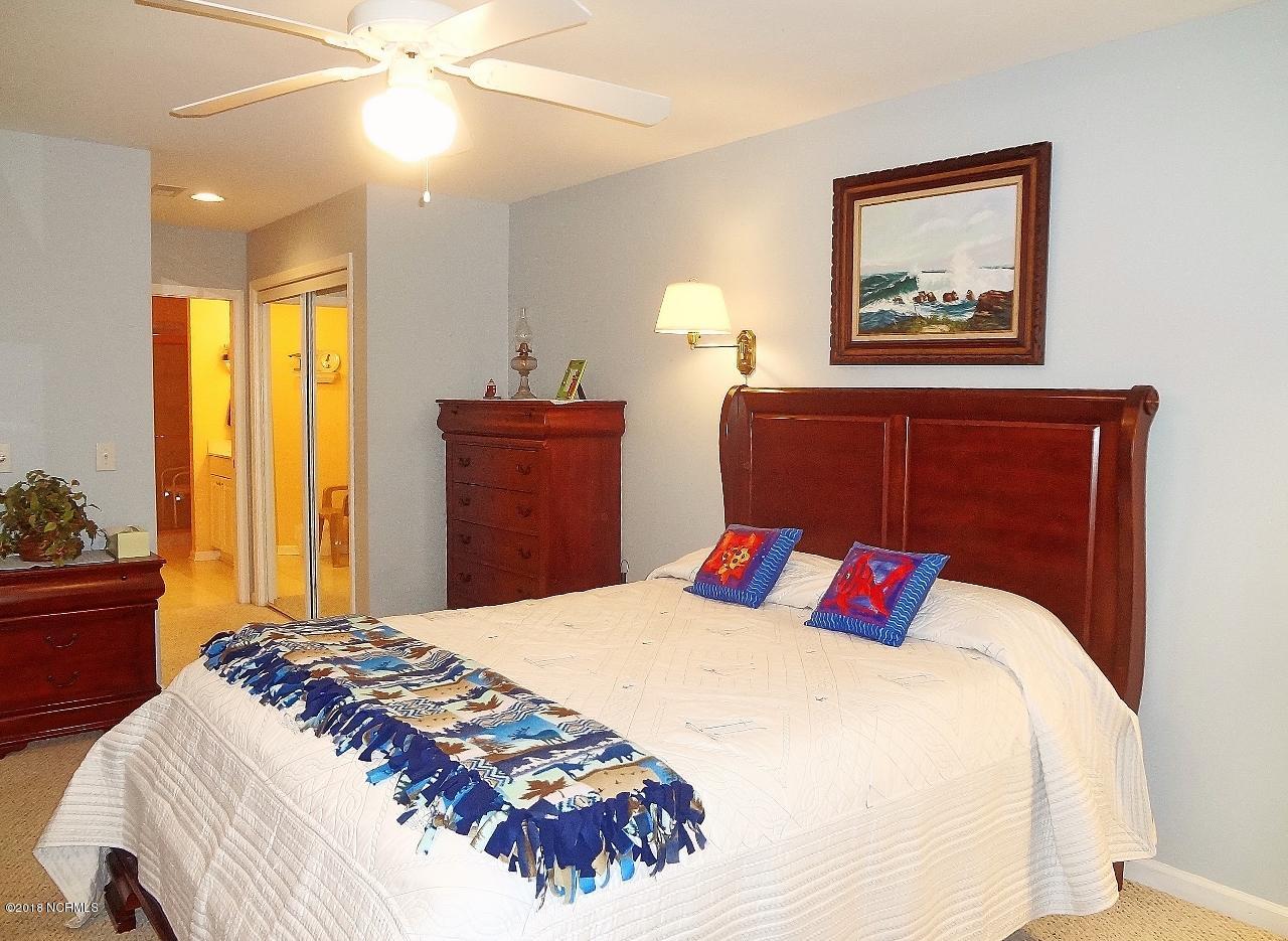 119 Rice Mill Circle, Unit 1 Sunset Beach, NC 28468 - Photo 17 of 37 Master Bedroom