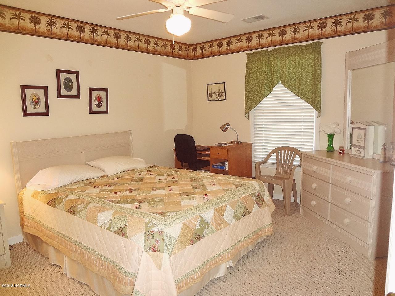 119 Rice Mill Circle, Unit 1 Sunset Beach, NC 28468 - Photo 21 of 37 Bedroom 2