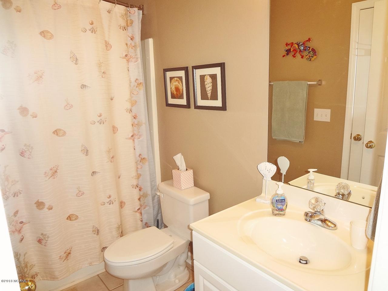 119 Rice Mill Circle, Unit 1 Sunset Beach, NC 28468 - Photo 23 of 37 Bathroom 2