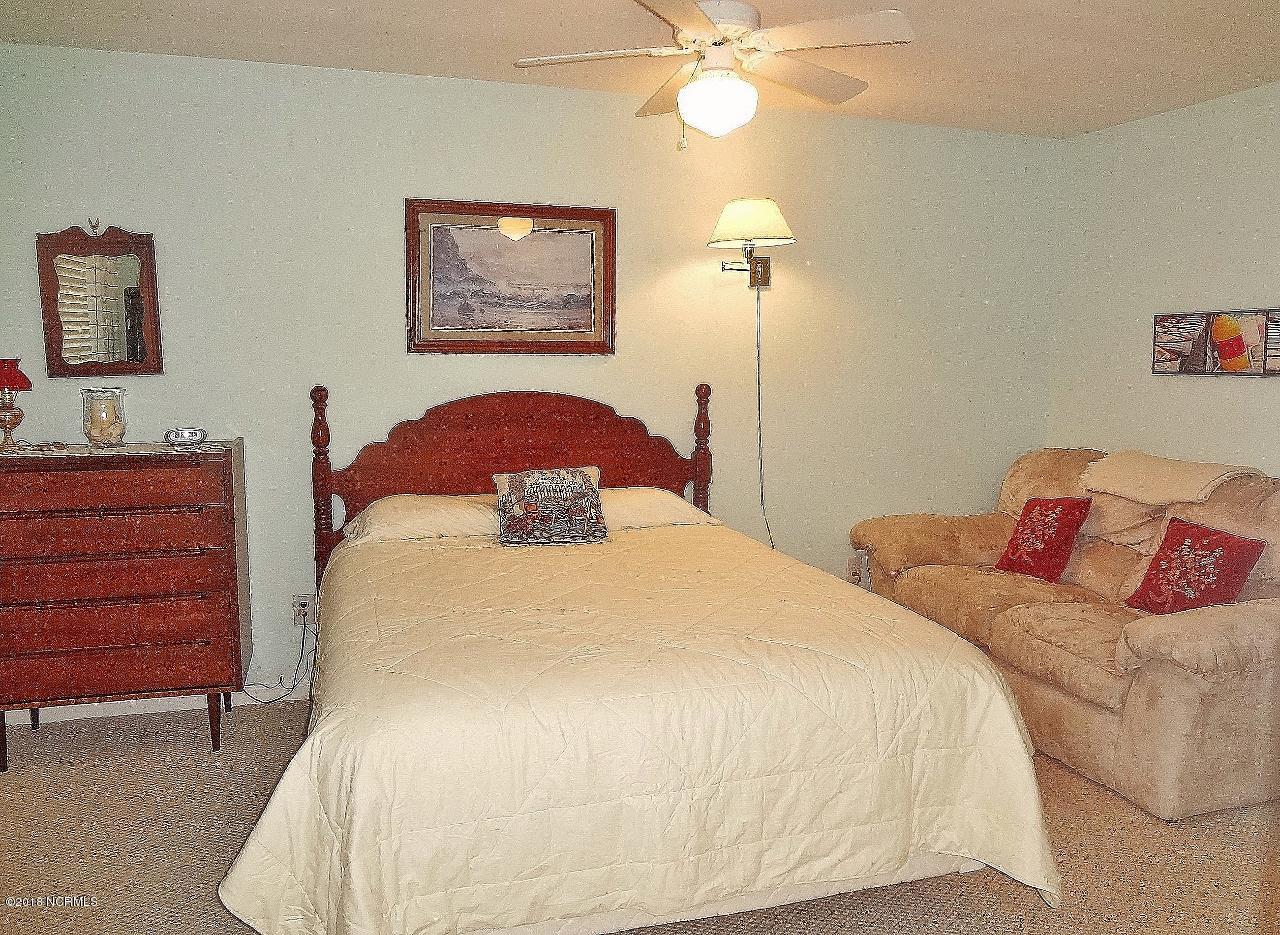 119 Rice Mill Circle, Unit 1 Sunset Beach, NC 28468 - Photo 25 of 37 Bedroom 3