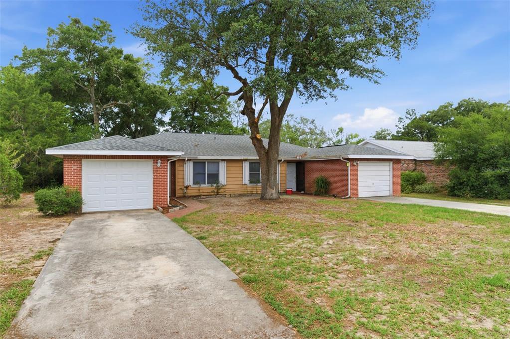 8124 Omaha Circle Spring Hill, FL 34606 - Photo 3 of 42
