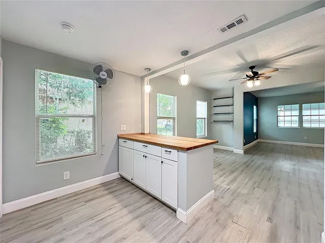 a bathroom with a toilet sink and shower
