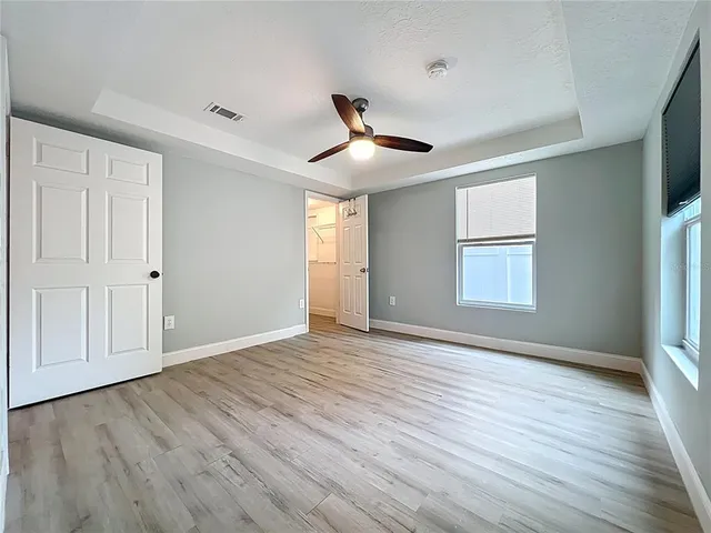 a view of backyard with cabin