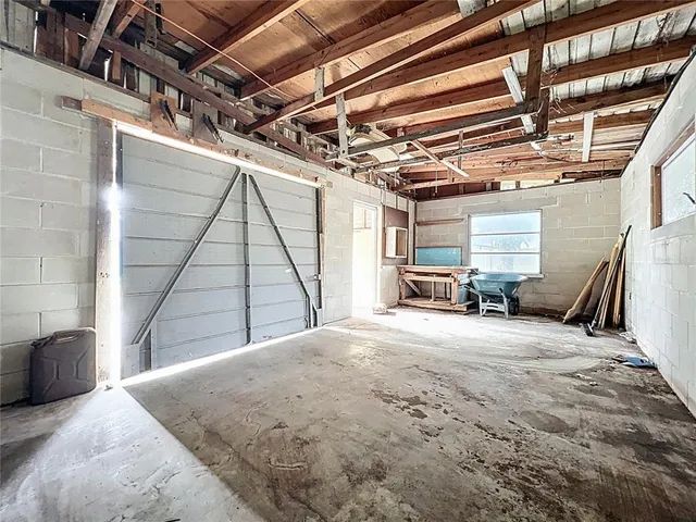 a view of a lake with houses in the background