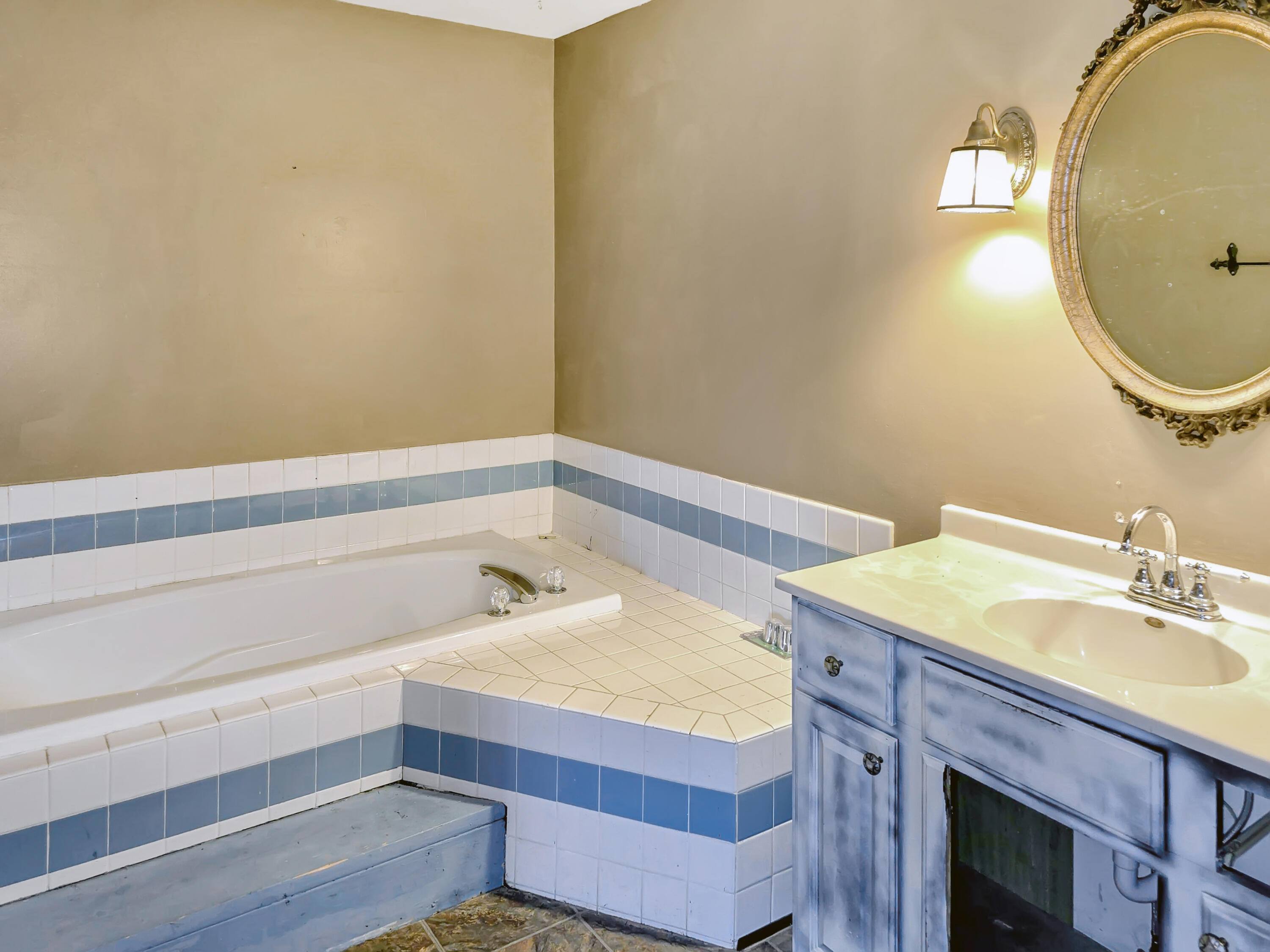 1538 Lake Street Hobart, IN 46342 - Photo 12 of 13 a bathroom with a sink and a mirror