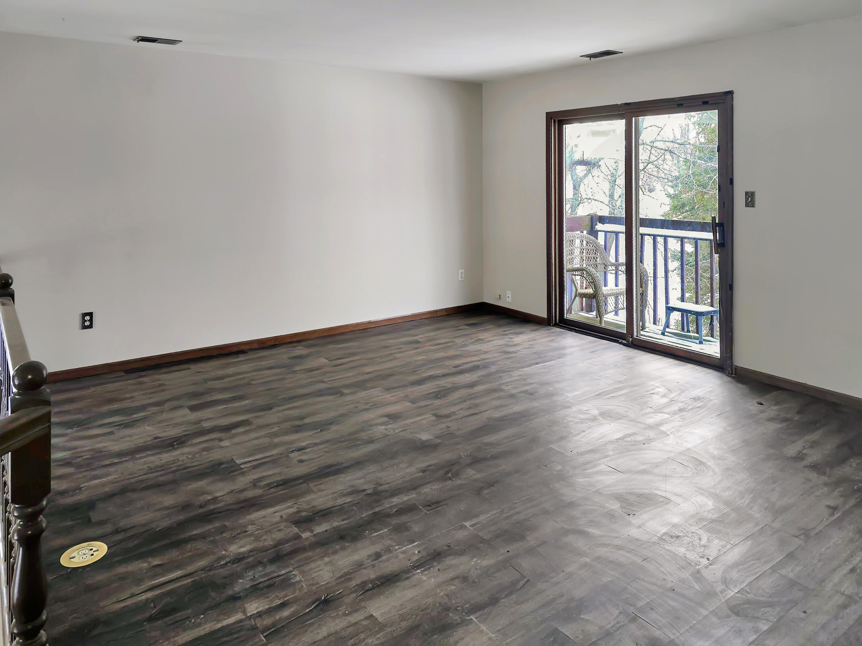 1538 Lake Street Hobart, IN 46342 - Photo 9 of 13 wooden floor in an empty room with a window