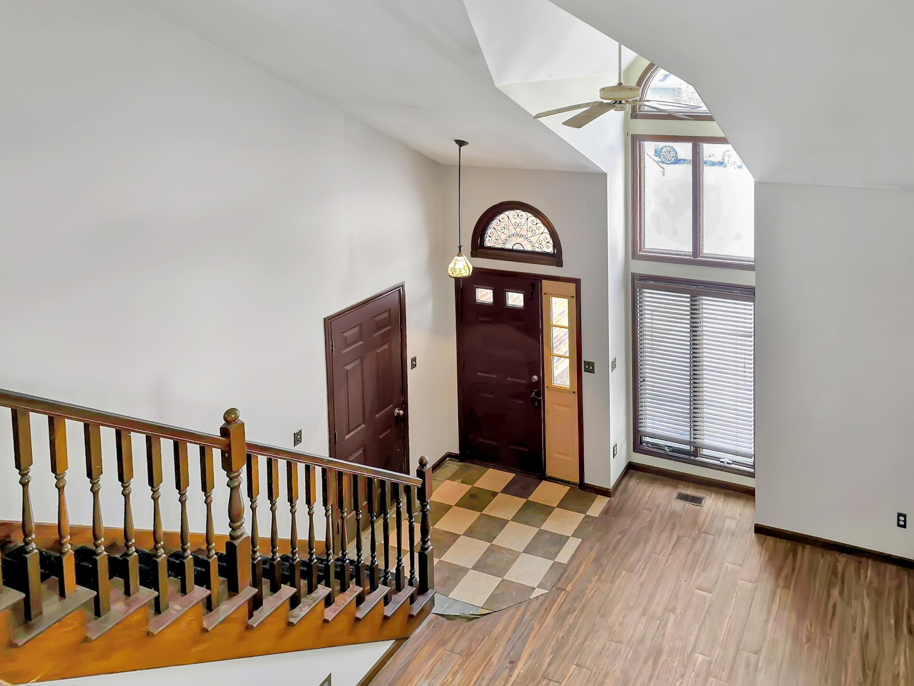 1538 Lake Street Hobart, IN 46342 - Photo 10 of 13 a view of entryway with a floor to ceiling window and wooden floor