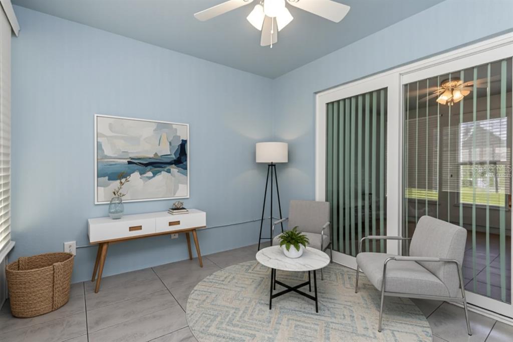 6520 Thicket Trail New Port Richey, FL 34653 - Photo 24 of 43 a living room with furniture and a painting on the wall