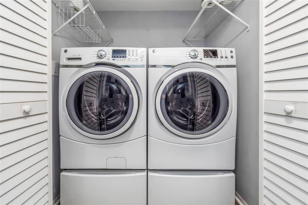 6520 Thicket Trail New Port Richey, FL 34653 - Photo 35 of 43 a utility room with dryer and washer