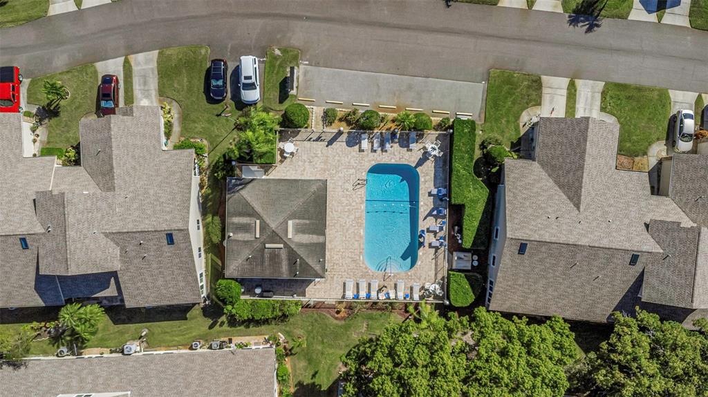 6520 Thicket Trail New Port Richey, FL 34653 - Photo 41 of 43 an aerial view of a house with a yard and a fountain