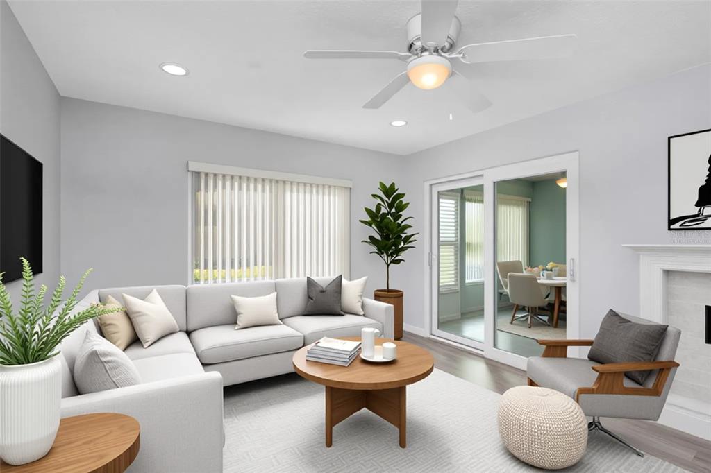 6520 Thicket Trail New Port Richey, FL 34653 - Photo 5 of 43 a living room with furniture and a large window