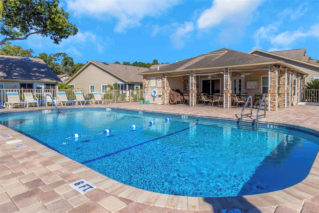 6520 Thicket Trail New Port Richey, FL 34653 - Photo 8 of 43 a view of a house with pool and sitting area