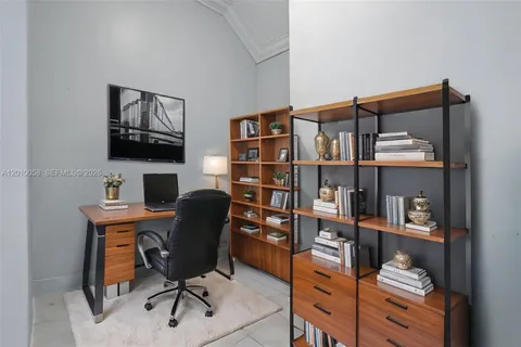 a view of a workspace with furniture
