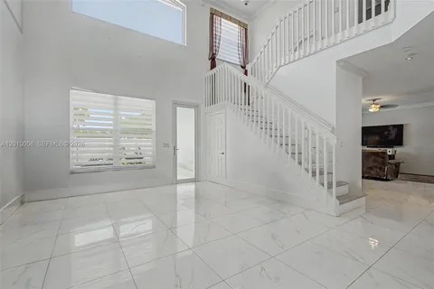 a view of an entryway with workspace