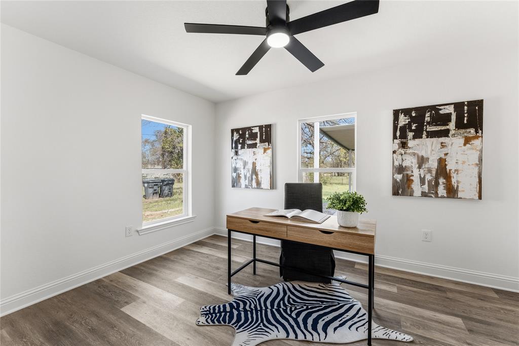 815 Garrison Street Waco, TX 76704 - Photo 22 of 36 a workspace with furniture and window